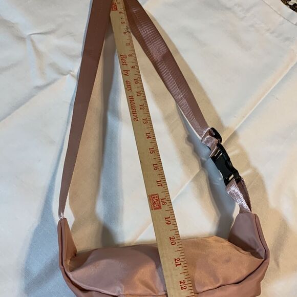 Light pink sling bag with for zipper closure pockets. NWT from local boutique. - Picture 7 of 10